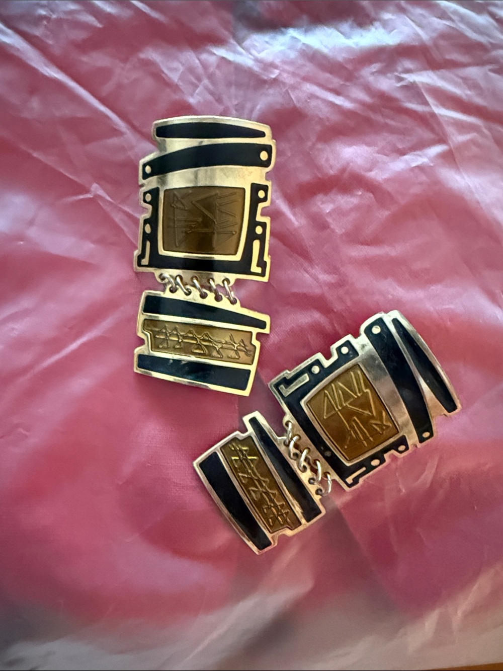Aztec pear earrings, black with calligraphy around it beautiful